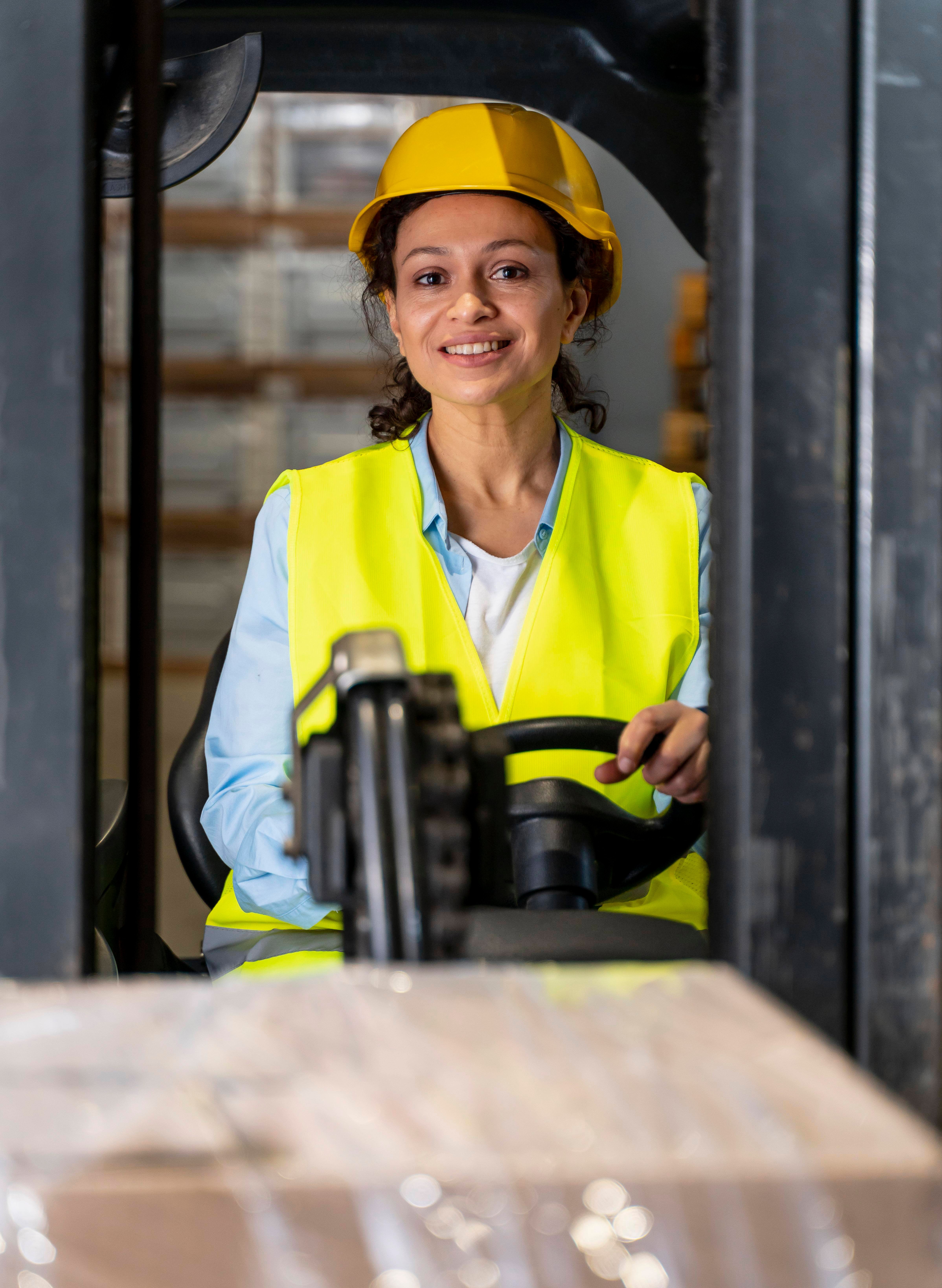 woman-driving-warehouse-loading-machine